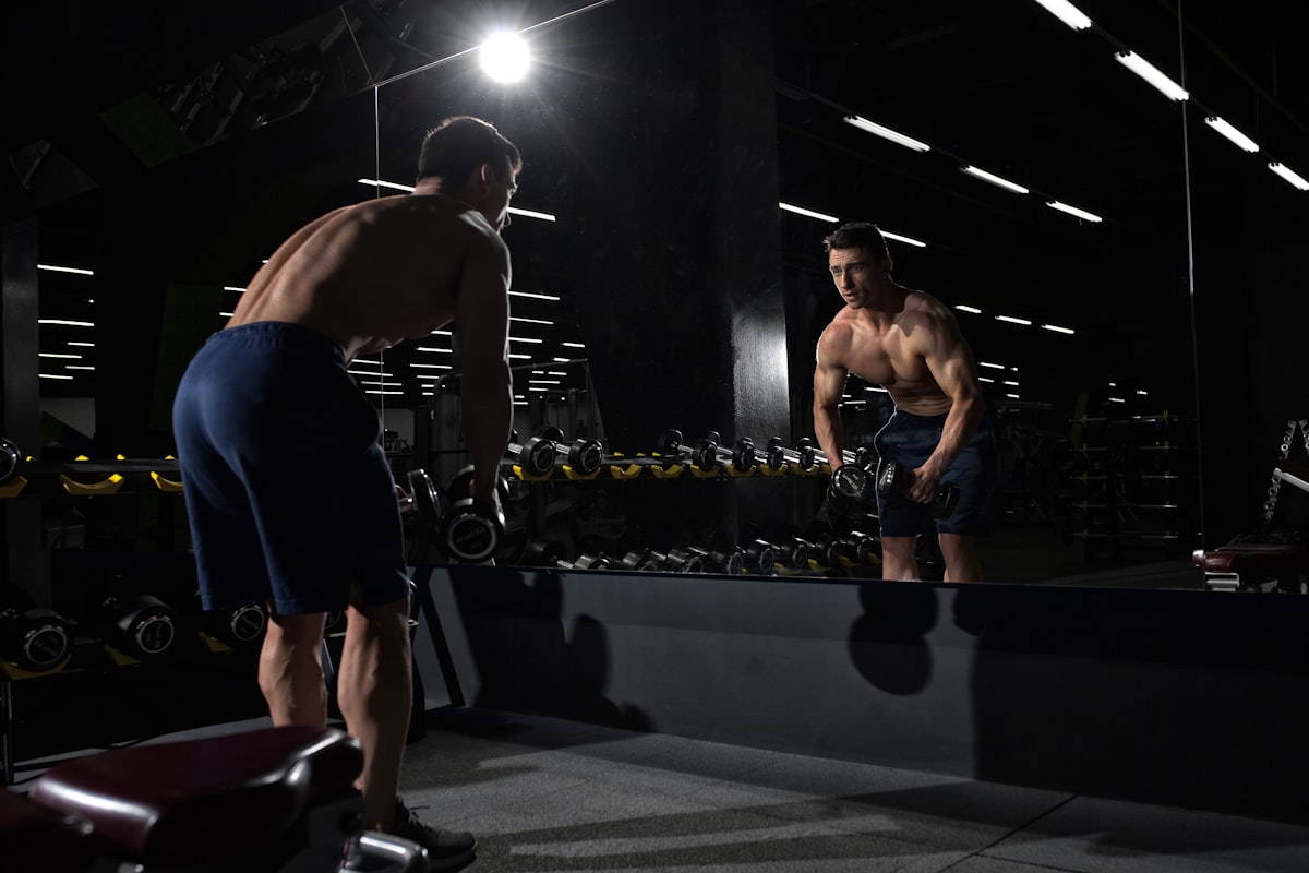 Man reviewing supplement research and nutrition guides