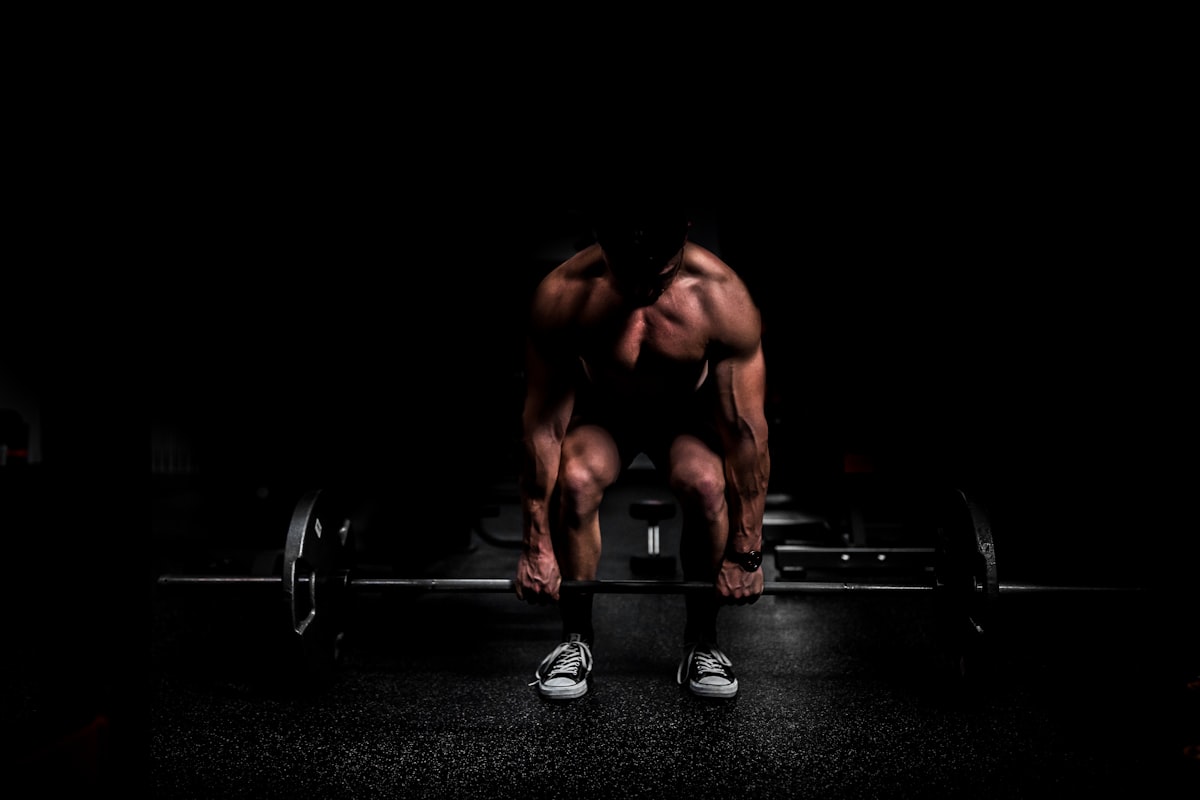 Man doing strength training in the gym